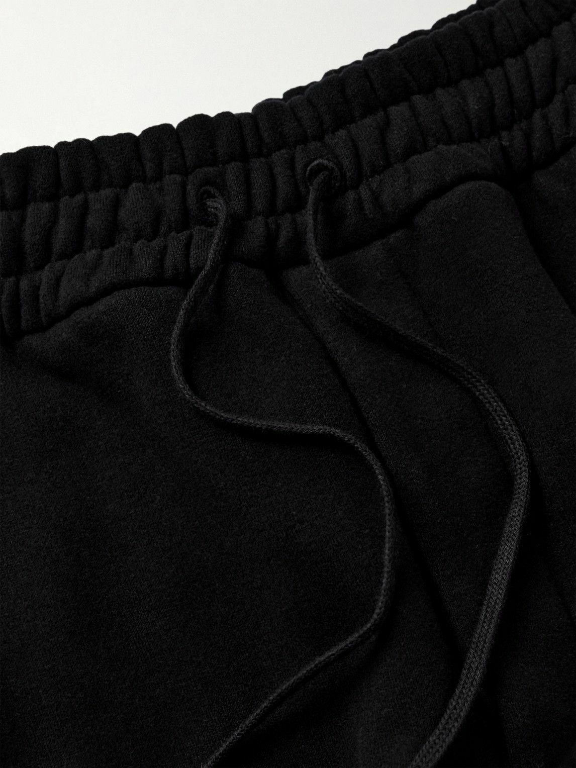 SAINT LAURENT - Tapered Logo-Embroidered Cotton-Jersey Sweatpants - Black
