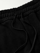 SAINT LAURENT - Tapered Logo-Embroidered Cotton-Jersey Sweatpants - Black