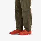 Air Jordan x Nigel Sylvester 4 Retro OG SP Sneaker in Firewood Orange/Sail/Cinnabar