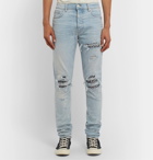 AMIRI - MX1 Skinny-Fit Panelled Distressed Stretch-Denim Jeans - Blue