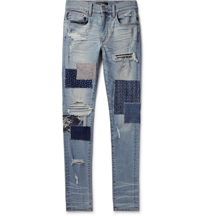 Photo: AMIRI - Skinny-Fit Panelled Distressed Stretch-Denim Jeans - Light denim