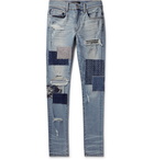 AMIRI - Skinny-Fit Panelled Distressed Stretch-Denim Jeans - Light denim