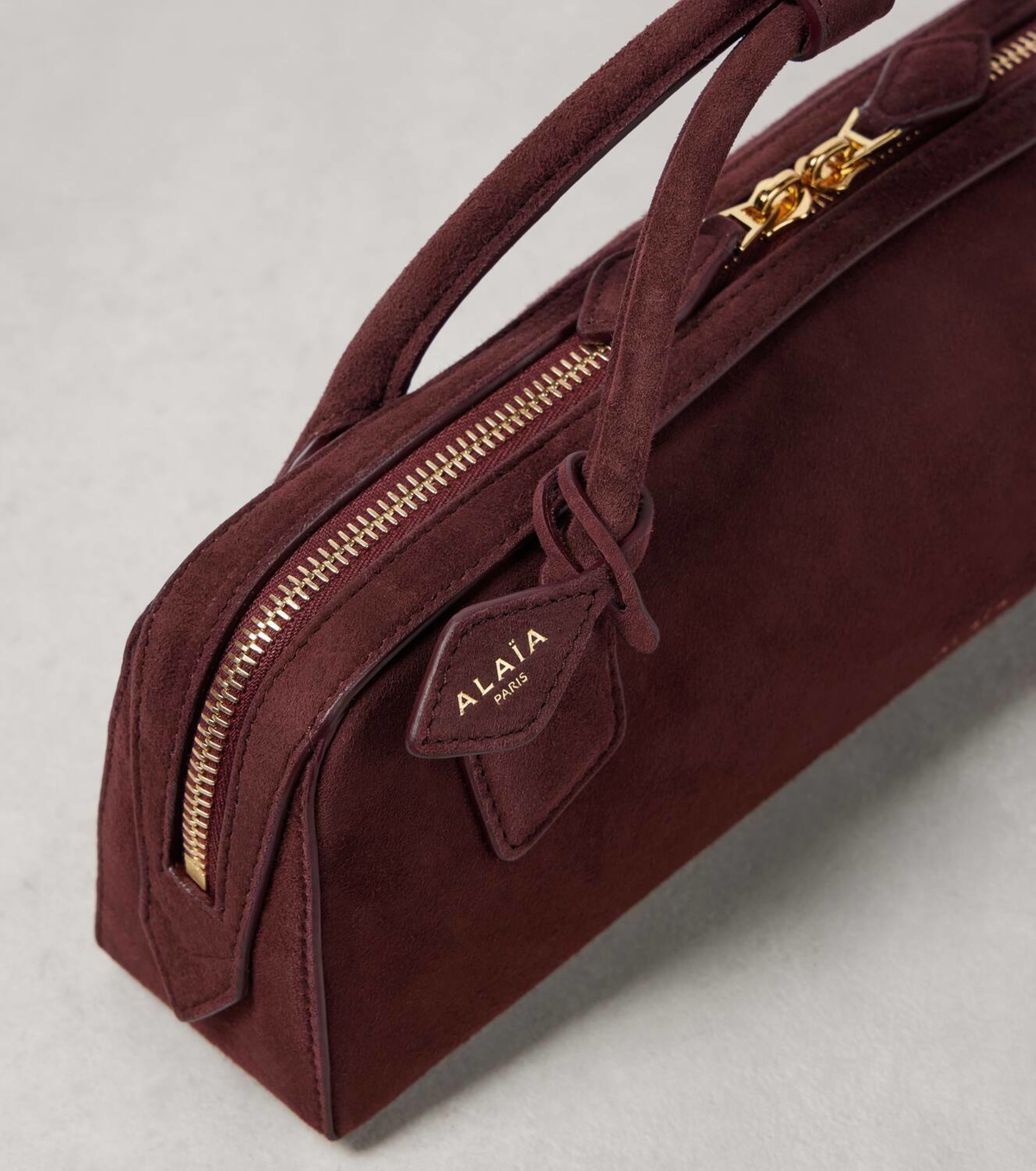 Alaïa Le Teckel suede clutch