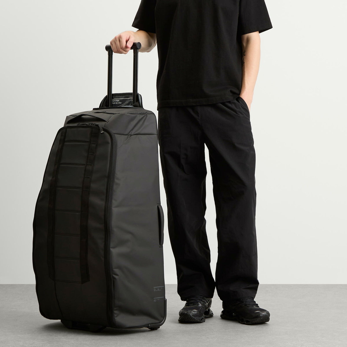 Db Journey Hugger Roller Bag Carry-On - 90L in Black Out 