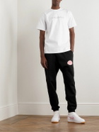 Coral Studios - Tapered Logo-Print Cotton-Jersey Sweatpants - Black