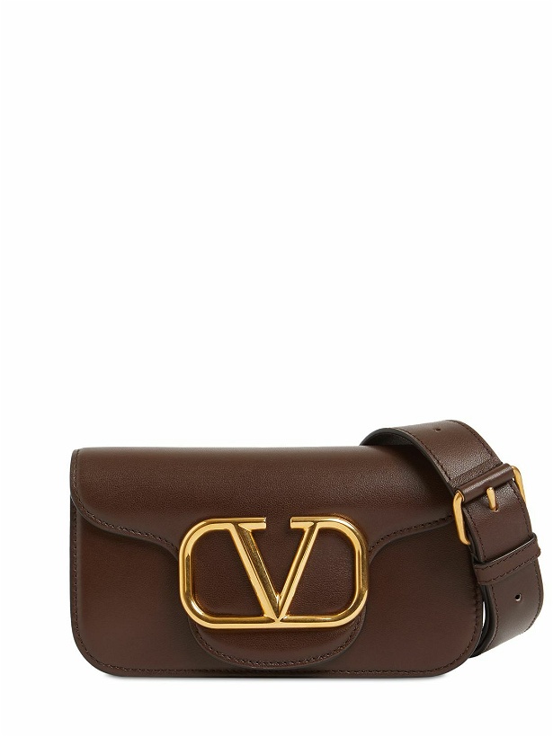 Photo: VALENTINO GARAVANI - Mini Locò Leather Crossbody Bag