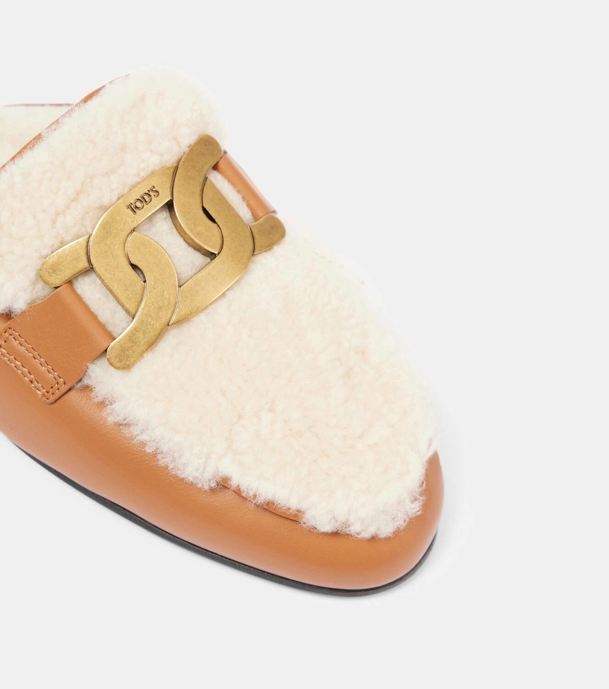 Tod's Catena shearling-lined leather slippers
