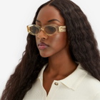Miu Miu Eyewear Women's 11WS Sunglasses in Sand Transparent/Dark Brown 