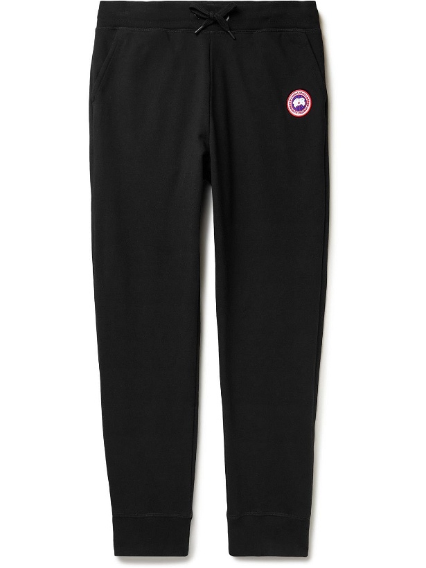 Photo: Canada Goose - Huron Tapered Logo-Appliquéd Cotton-Jersey Sweatpants - Black