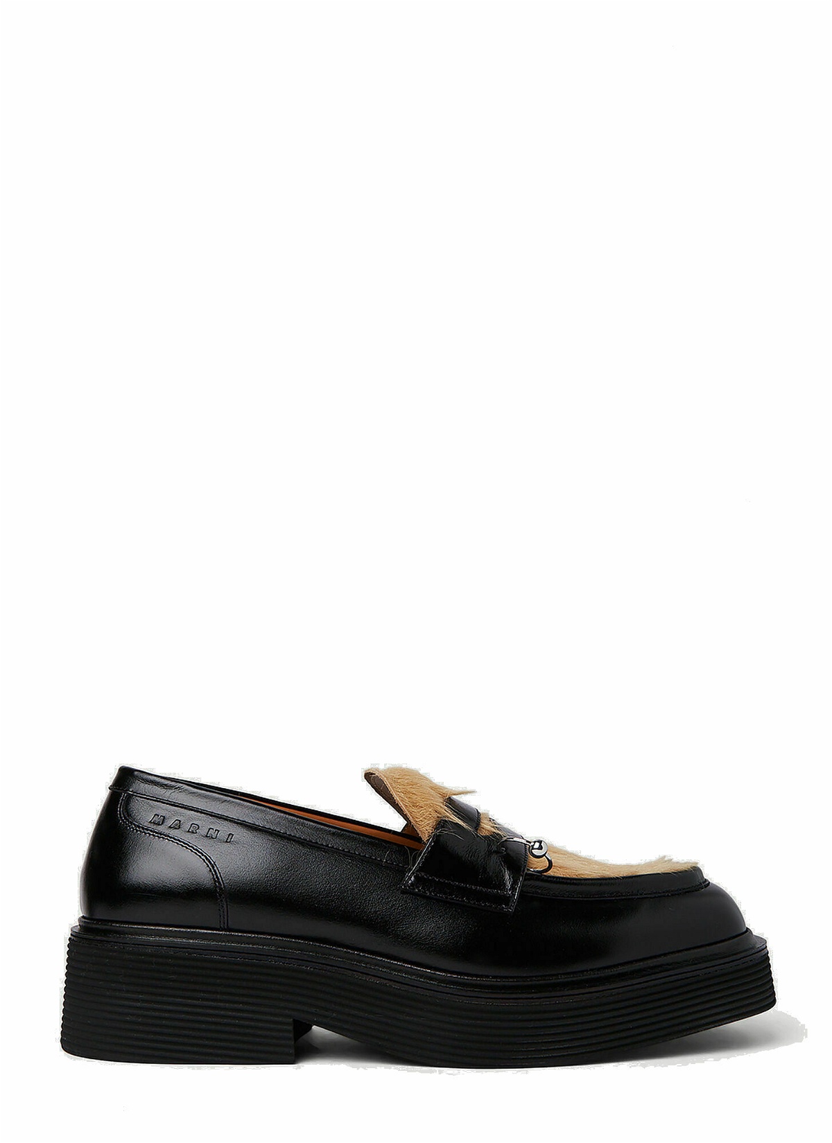 Photo: Pierced Hair Loafers in Black