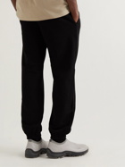 MCQ - Tapered Logo-Appliquéd Cotton-Jersey Sweatpants - Black