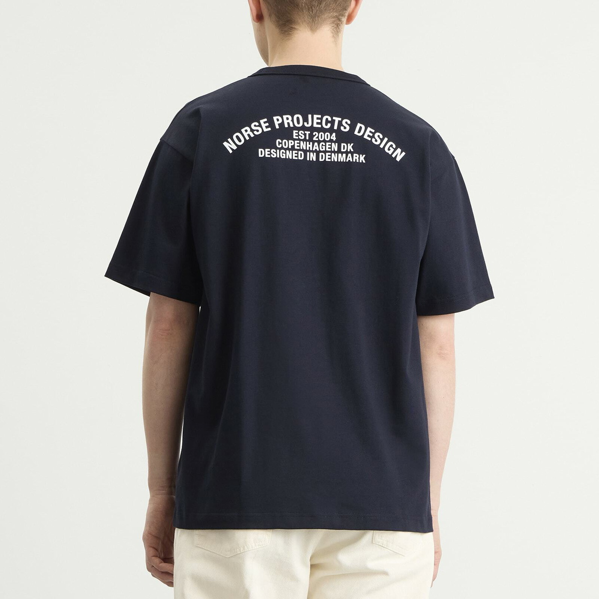 Norse Projects Men's Snekkersten Back Arch Logo T-Shirt in Dark Navy