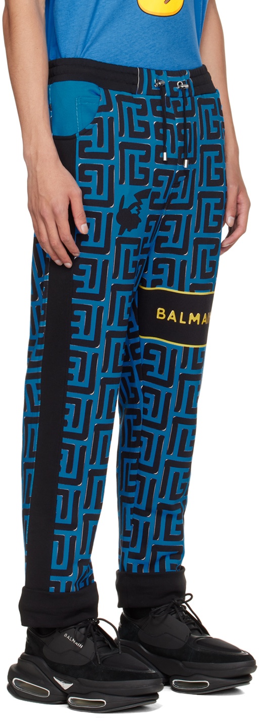 Balmain monogram-print Track Pants - Blue