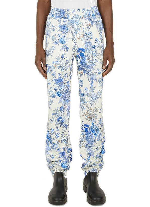 Photo: Floral Print Track Pants in Blue