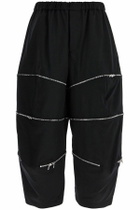 COMME DES GARCONS BLACK cropped pants with zip openings. Black
