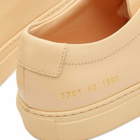Woman by Common Projects Women's Original Achilles Low Sneakers in Apricot