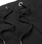 McQ Alexander McQueen - Tapered Logo-Trimmed Loopback Cotton-Jersey Sweatpants - Men - Black