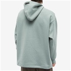 Fear of God ESSENTIALS Men's Relaxed Hoodie in Sycamore