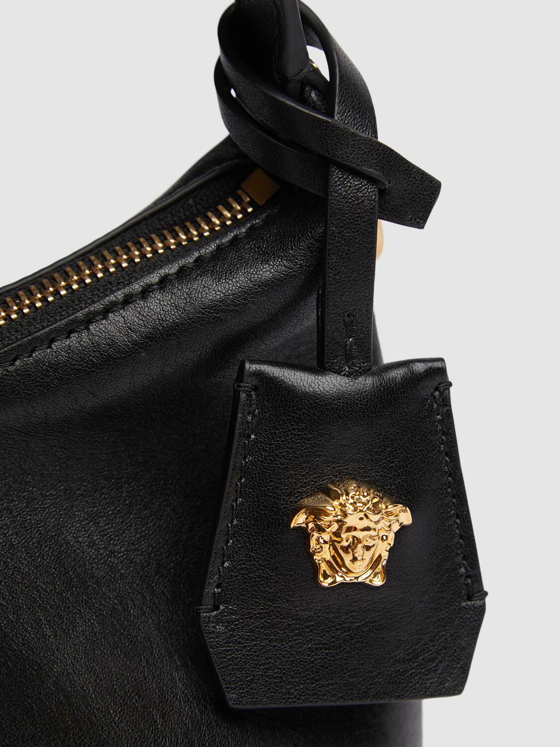 【関税＆送料込み】Versace Versace Tag Hobo Bag In Leather Versace Tag Hobo Bag | Black | FARFETCH