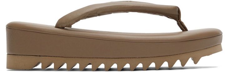 Photo: Undercover Beige Leather Flip Flops