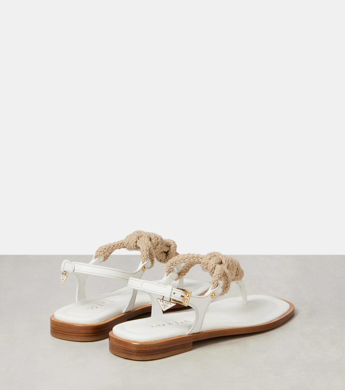 Prada Leather-trimmed thong sandals