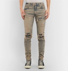 AMIRI - MX1 Skinny-Fit Panelled Distressed Stretch-Denim Jeans - Men - Blue