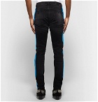 AMIRI - Broken Track Skinny-Fit Striped Distressed Stretch-Denim Jeans - Men - Black