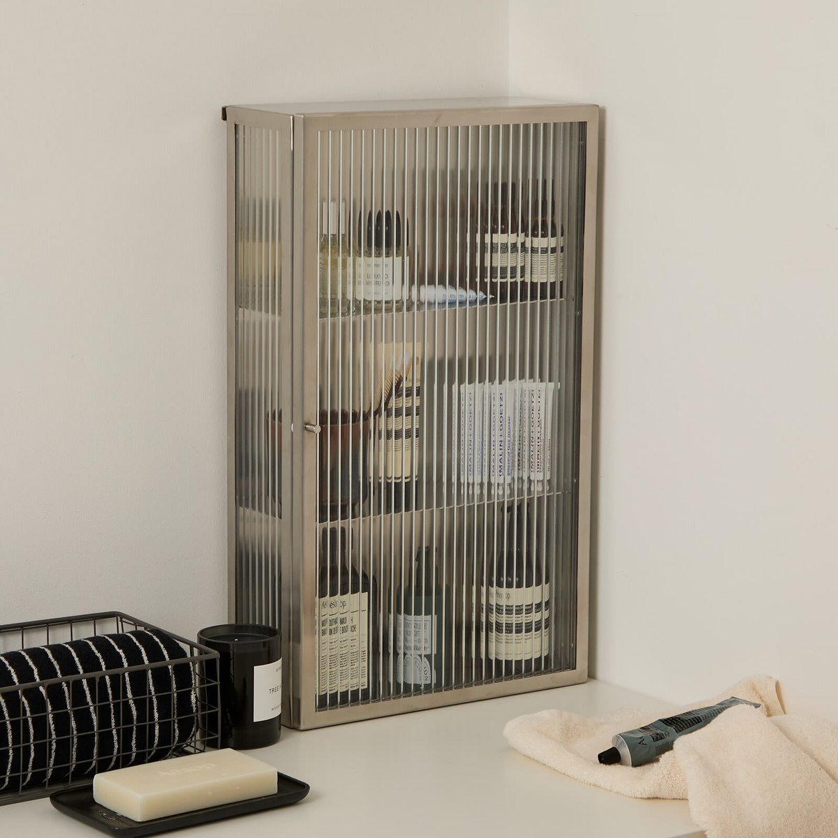 ferm LIVING Haze Wall Cabinet - Reeded Glass in Stainless Steel 