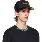 mastermind WORLD Black and Yellow Happy Skull Trucker Cap