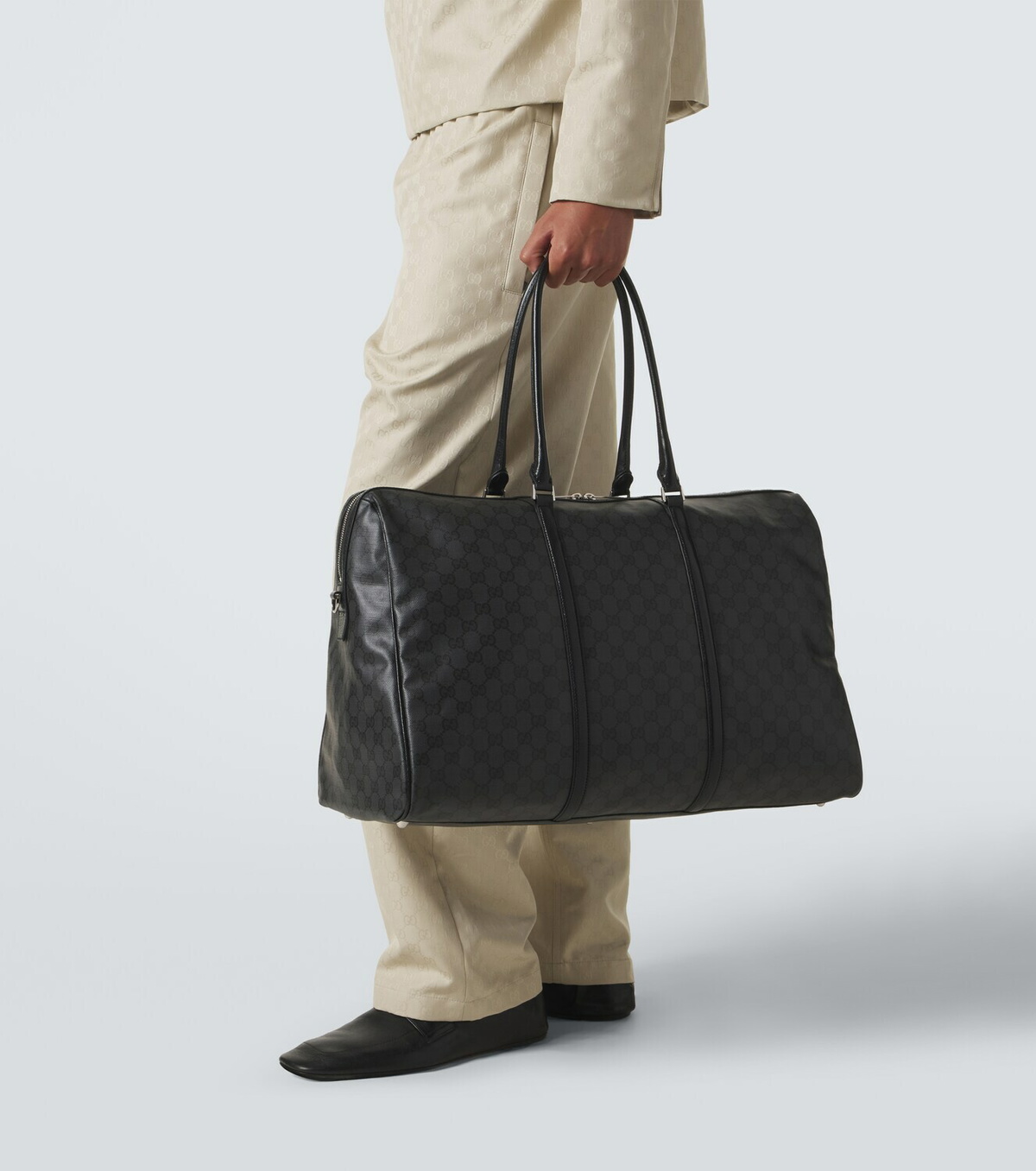 Gucci GG canvas leather-trimmed duffel bag