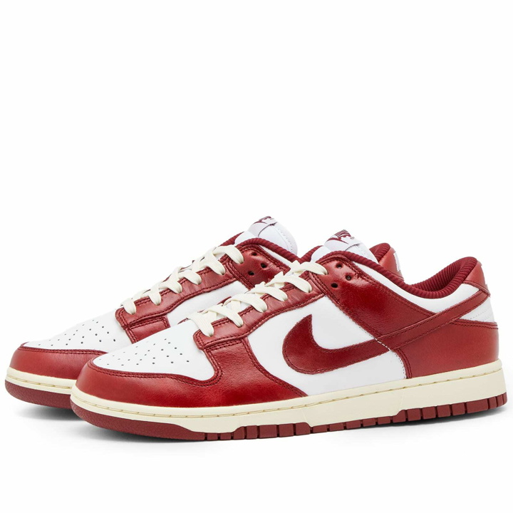 Photo: Nike Dunk Low Prm W Sneakers in White/Team Red/Coconut Milk