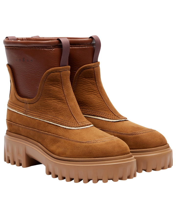 Photo: Hogan Shearling-lined leather ankle boots