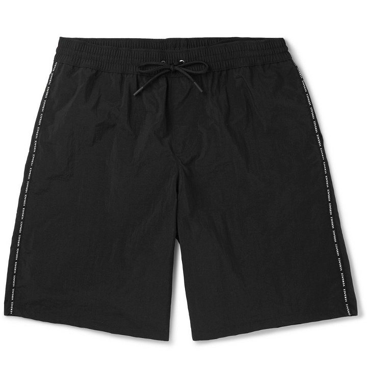 Photo: Versace - Long-Length Logo-Print Swim Shorts - Men - Black