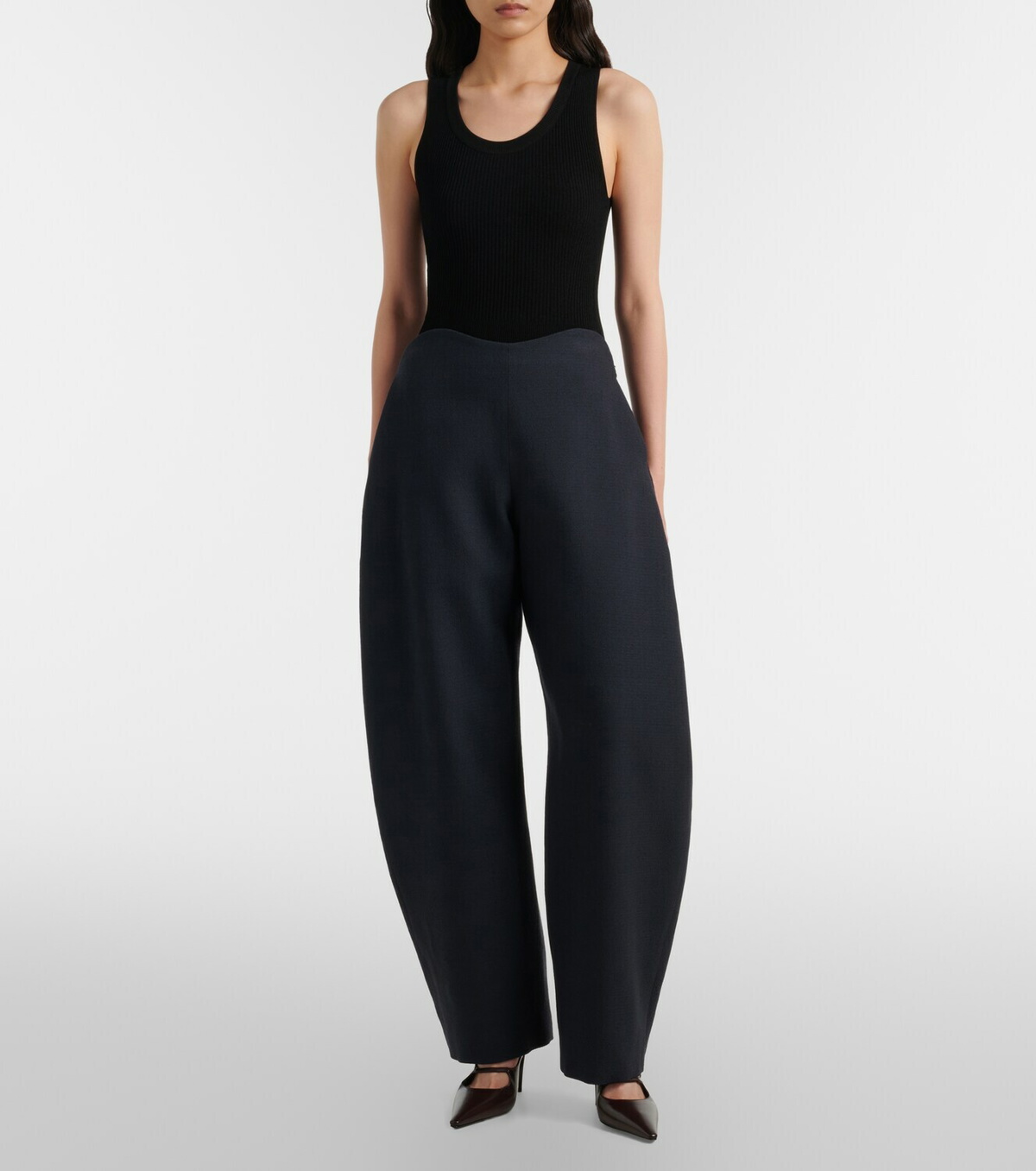 Alaïa Round wool crepe barrel-leg pants