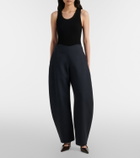 Alaïa Round wool crepe barrel-leg pants