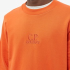 C.P. Company Men's Garment Dyed Centre Logo Crew Sweat in Harvest Pumpkin