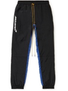 Rhude - McLarenTapered Logo-Print Nylon Sweatpants - Black