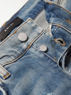 AMIRI - Slim-Fit Patchwork Distressed Stretch-Denim Jeans - Blue