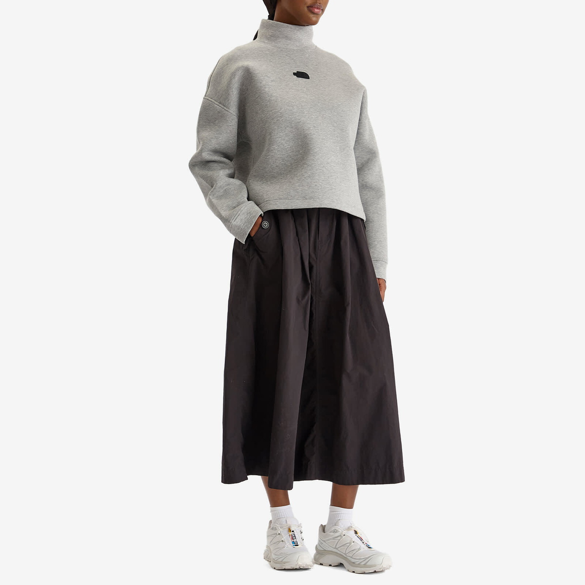 The North Face Women's Mock Neck Relaxed Sweatshirt in Metallic Silver Heather