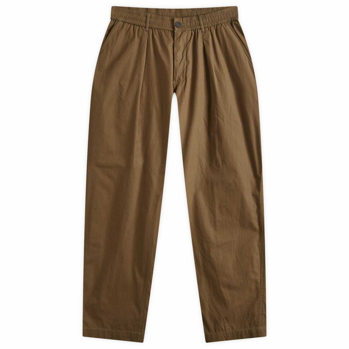 Photo: Universal Works Men's Linen Slub Pleated Track Pants in Khaki