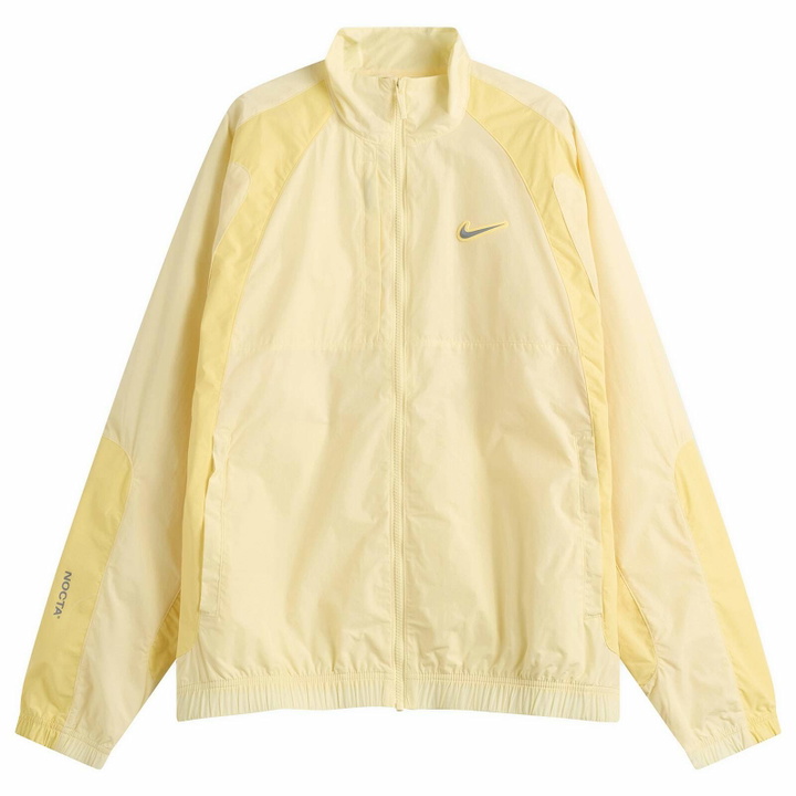 Photo: Nike Men's x Nocta Woven Track Jacket in Alabaster/Orange/Platinum