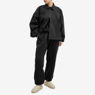 Fear of God ESSENTIALS Women's Shell Bomber Jacket in Overdye Black Denim