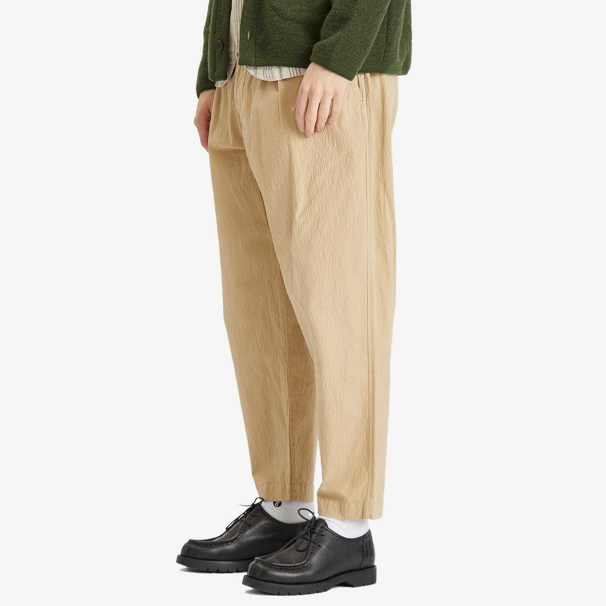 Universal Works Men's Seersucker Pleated Track Pant in Sand