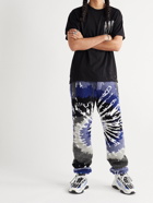 AMIRI - Tapered Leather-Trimmed Tie-Dyed Fleece Sweatpants - Blue