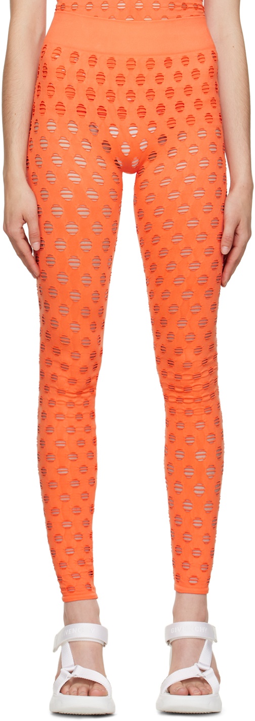 Photo: Maisie Wilen Orange Perforated Leggings