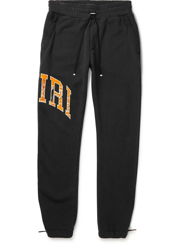 Photo: AMIRI - Slim-Fit Tapered Logo-Appliquéd Cotton-Jersey Sweatpants - Black