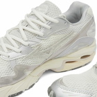 Mizuno Wave Rider 10 Sneakers in Snow White/White Sand/Nimbus Cloud