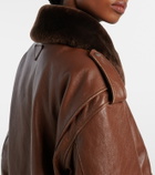 Prada Shearling-trimmed leather jacket