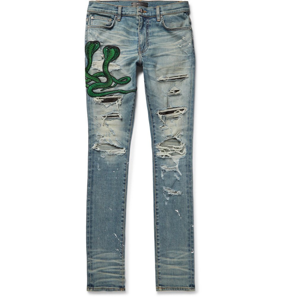 AMIRI - Thrasher Skinny-Fit Appliquéd Distressed Stretch-Denim Jeans ...
