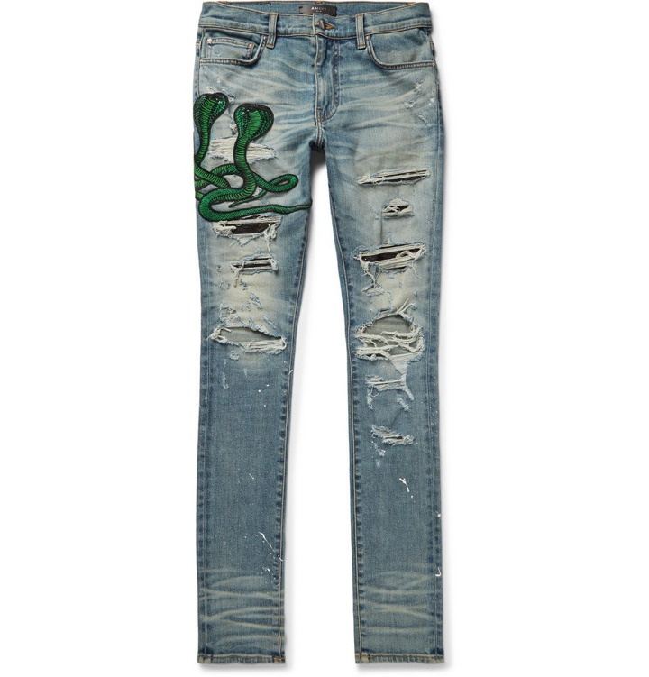 Photo: AMIRI - Thrasher Skinny-Fit Appliquéd Distressed Stretch-Denim Jeans - Men - Light denim